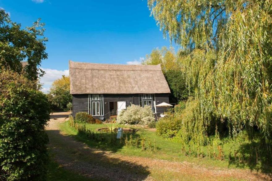 Deepwell Granary is a lovely thatched barn with attached meadow woodland
