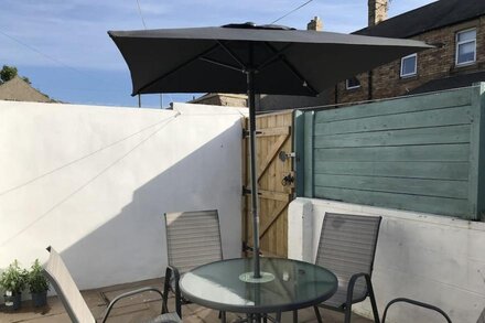 A cosy stone terrace in the fishing village of Amble