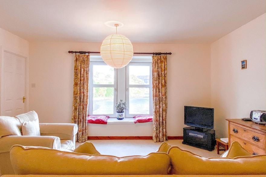 BEAUTIFUL TWO BEDROOM HOME LOCATED  IN PORTREE HARBOUR STEPS AWAY FROM THE SEA