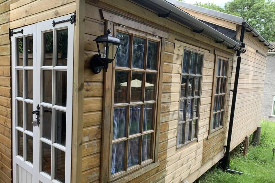 The Knapsack <br>Is a unique wooden cabin in the stunning Frome Valley walk way <br>