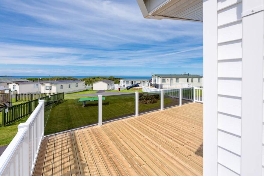 Holiday Lodge in Nefyn, private access to beach, sea views & enclosed play area