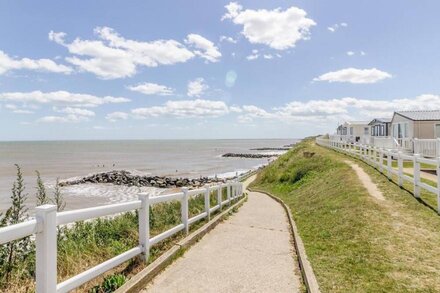 Luxury caravan for hire at Hopton Holiday Park with full sea views ref 80010H