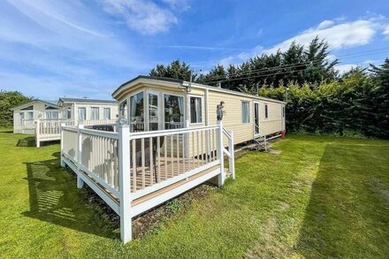 Lovely caravan with decking on a great holiday park ref 10002B