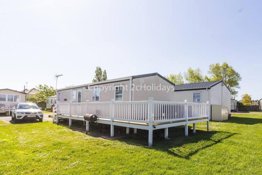 8 Berth Caravan With Decking To Hire At Naze Marine In Essex Ref 17045NM