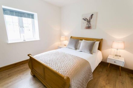 Carrog Barn -  a ground floor bedroom that sleeps 6 guests  in 3 bedrooms