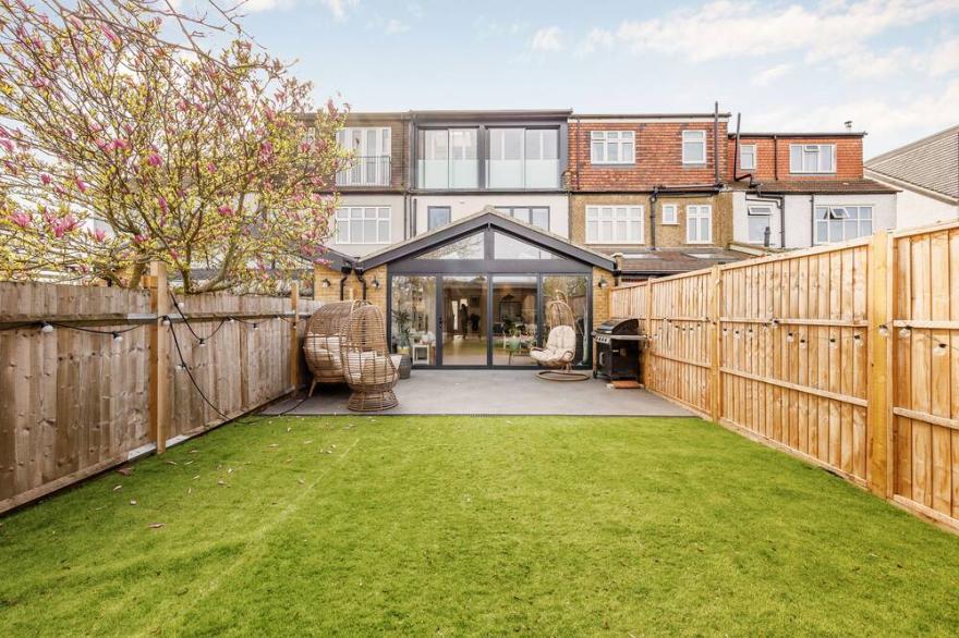 A Substantial Modern Terraced House IN West London