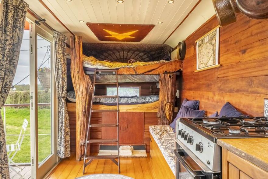 Set in a wild flower meadow, Douglas is completely eco friendly and off-grid.