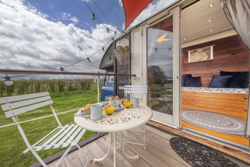 Set in a wild flower meadow, Douglas is completely eco friendly and off-grid.