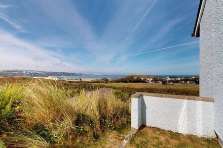 Beach front location with a sunny enclosed garden, three bedrooms and views of St Ives