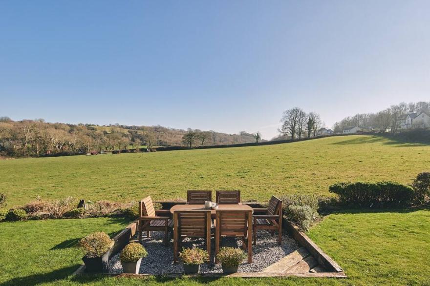 Benllech Beach House, located on the outskirts of the popular beach village of Benllech; a beautiful