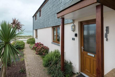 Sea Gem with views of Port Gaverne and the sea