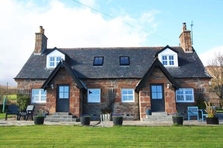 Traditional Highland semi-detached old stone cottage