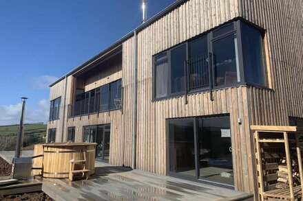 Fabulous barn, tennis court,wood fired hot tub tucked away on working farm