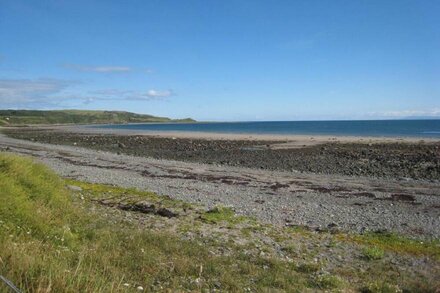 The Haven nestling in an idyllic setting on the shore of Luce Bay in Galloway a