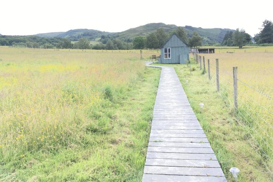 Tiny House In A Hay Field Near Loch Ness