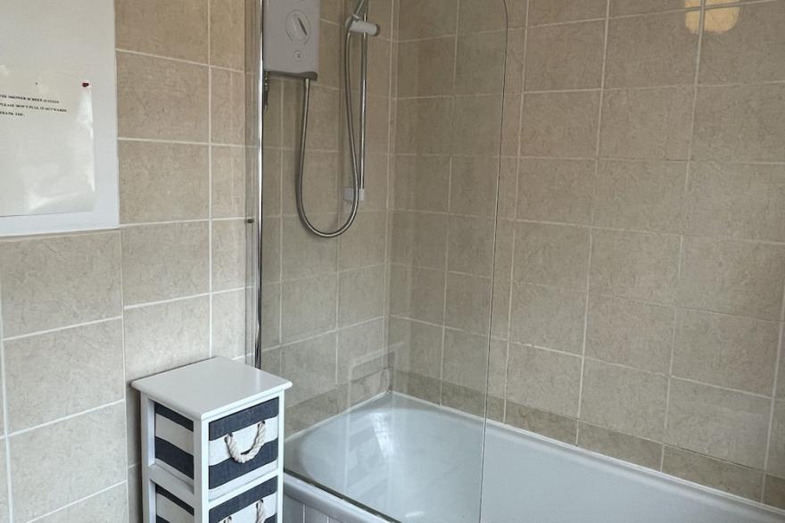 Harthaven.  Three bedroomed flat, opposite Rugby Club.