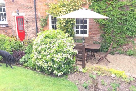 A beautiful cottage set in the grounds of Hunmanby Hall, Hunmanby, near Filey.