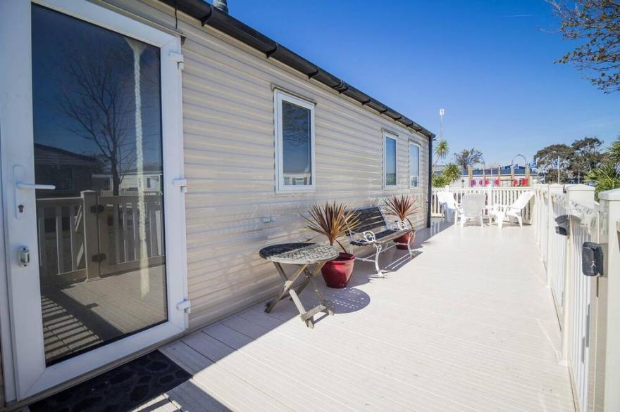 6 berth caravan with decking and WiFi at Suffolk Sands Holiday Park ref 45040G