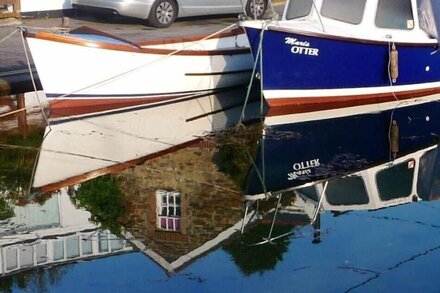 Idyllic cottage with log fires and private riverside terrace on Fowey Estuary