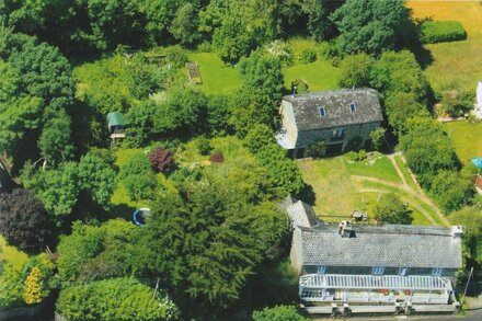 Delightful open plan barn conversion with piano in historic Dartmoor village