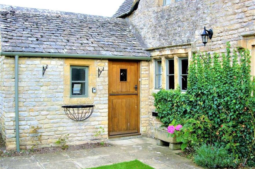A Quaint Grade 11 Listed Detached Stone Cottage In Lower Slaughter with parking.