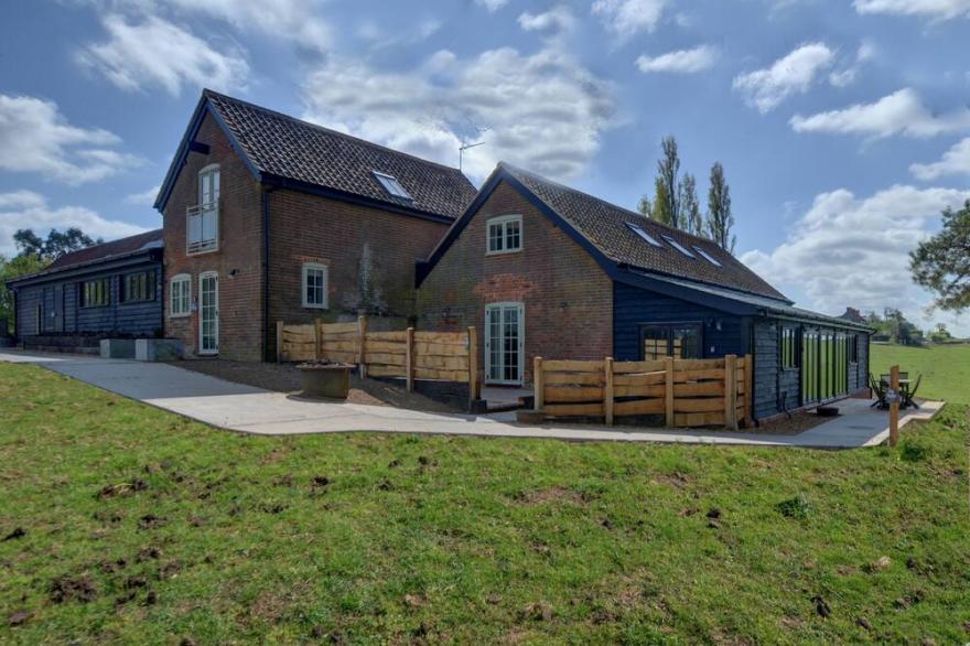 This venue consists of three interconnected holiday cottages in a rural location