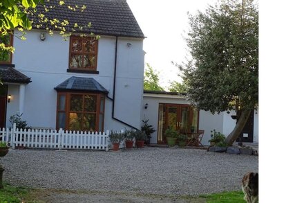 Cosy quiet semirural self contained 2 bed cottage in a rural village location.