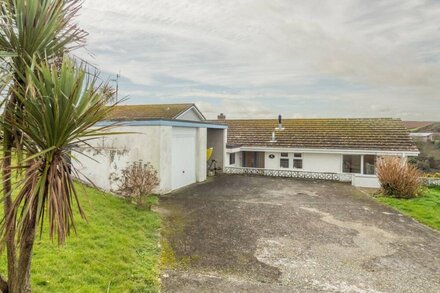 Silvershells is a three bedroom bungalow with outstanding harbour views.