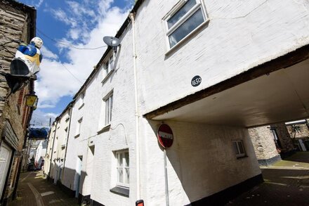 Beautiful property in the heart of Looe, yards from the beach with reserved parking space.