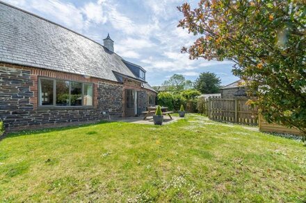 A stunning holiday home located in the Curved Stables at Roserrow.