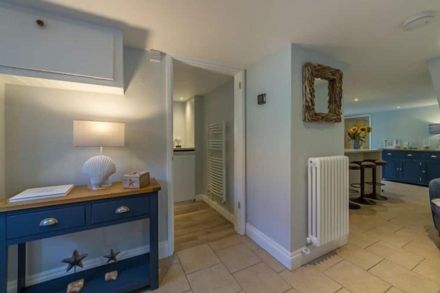 This wonderful retreat sleeps six and comes with a fabulous garden.