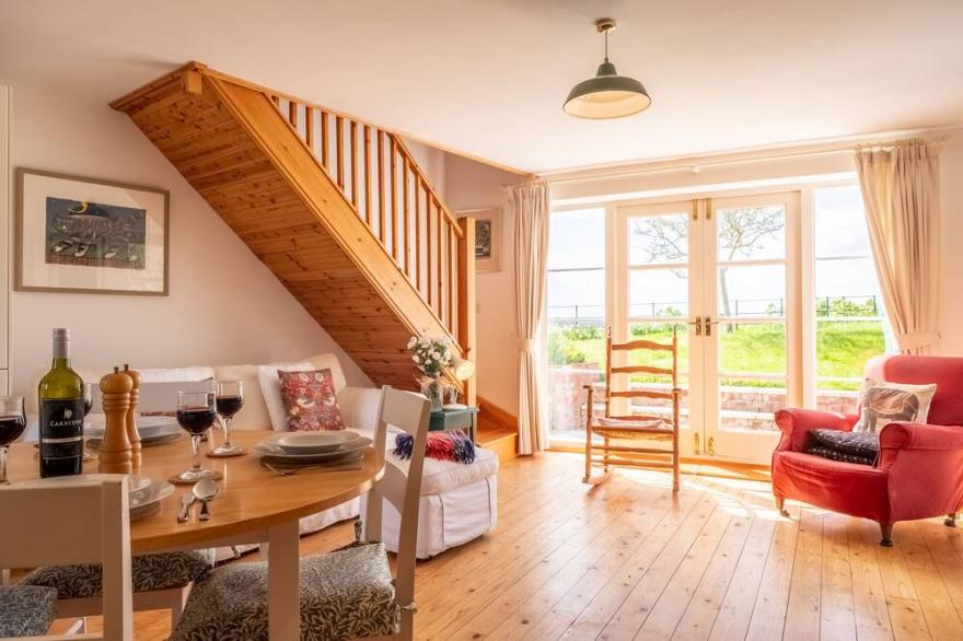 A brick and flint cottage in a quiet village that's been completely refurbished.