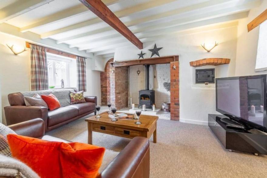 A fabulous, beautifully styled, attractive character carrstone cottage