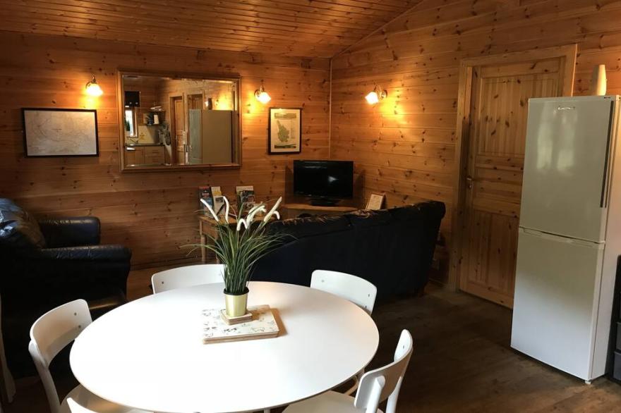 Self Catering Holiday Lodge set in 6 acres of wooded Hillside in South Wales
