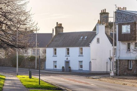 Central St Andrews townhouse with walled garden and private parking