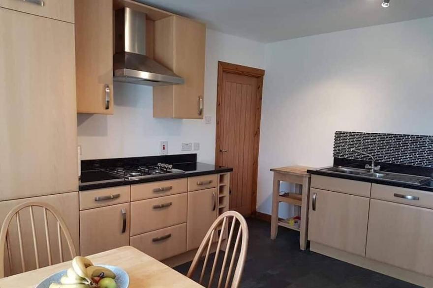 Bracara Cottage with stunning views of Loch Morar.