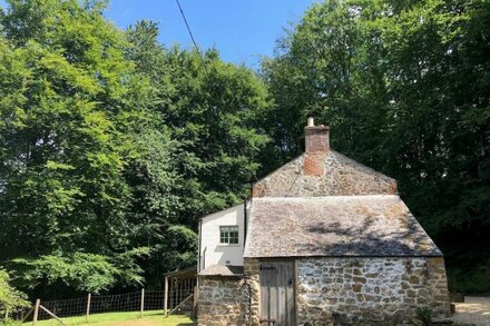 This cottage is located in its own magical woodland setting near Stoke Abbot.