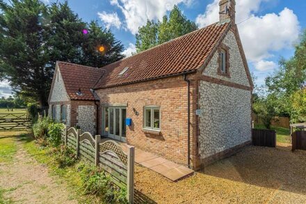 A beautiful detached property set back from the road on a little track.